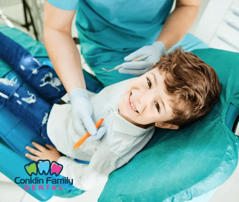 Kids dentist providing gentle dental care at Conklin Family Dental Brantford